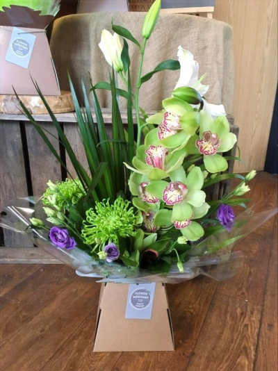 Oriental - A truly special green orchid with large leaves that makes a statement gift , handtiedand presented in a box.

 

Each and every display is one-of-a-kind, created by an artisan florist using the most beautiful and fresh stems available on the day so, whilst your gift may look different to the one pictured, we do guarantee that your specific arrangement will be fresh, beautiful and that your recipient will love it!