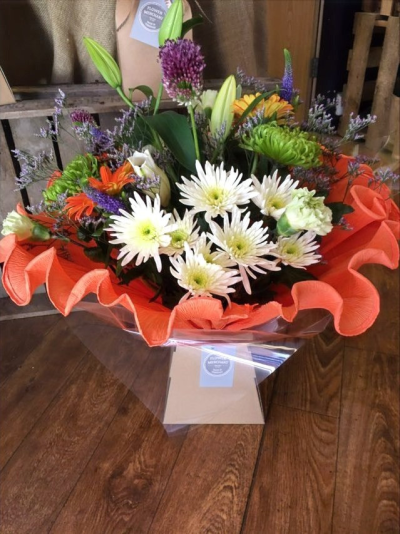 Tutti Fruitti - An exclusive hand picked selection of flowers in oranges, creams and greens, handtied, wrapped in hand crimped crepe and presented in a box.

 

Each and every display is one-of-a-kind, created by an artisan florist using the most beautiful and fresh stems available on the day so, whilst your gift may look different to the one pictured, we do guarantee that your specific arrangement will be fresh, beautiful and that your recipient will love it!