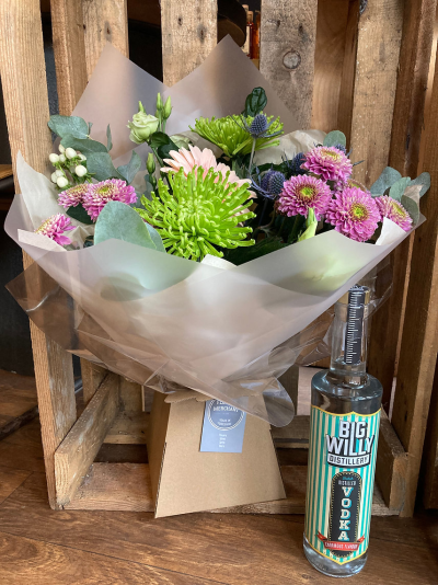 Naughty tipple - Seasonal flowers presented in a box with our exclusive 70cl Big Willy Vodka.