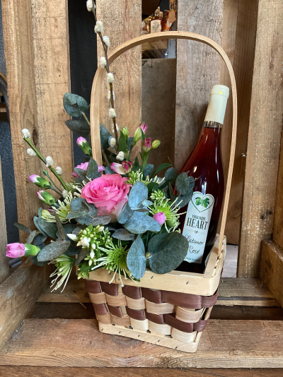 Basket of love - Seasonal basket of flowers with the addes bonus of a bottle of Yorkshire Heart wine.

a perfect two in one gift.