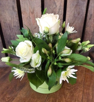 Just Because - Luxury flowers white and greens arranged in foam and presented in a hat box.

 

Each and every display is one-of-a-kind, created by an artisan florist using the most beautiful and fresh stems available on the day so, whilst your gift may look different to the one pictured, we do guarantee that your specific arrangement will be fresh, beautiful and that your recipient will love it!