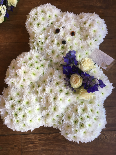 Teddy Tribute - Teddy bear tribute based in white chrysanths with a nice flower spray in a colour of your choice