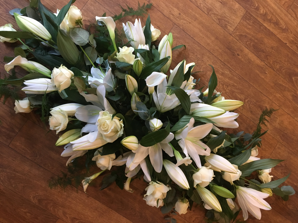 Pure Serenity Casket Spray