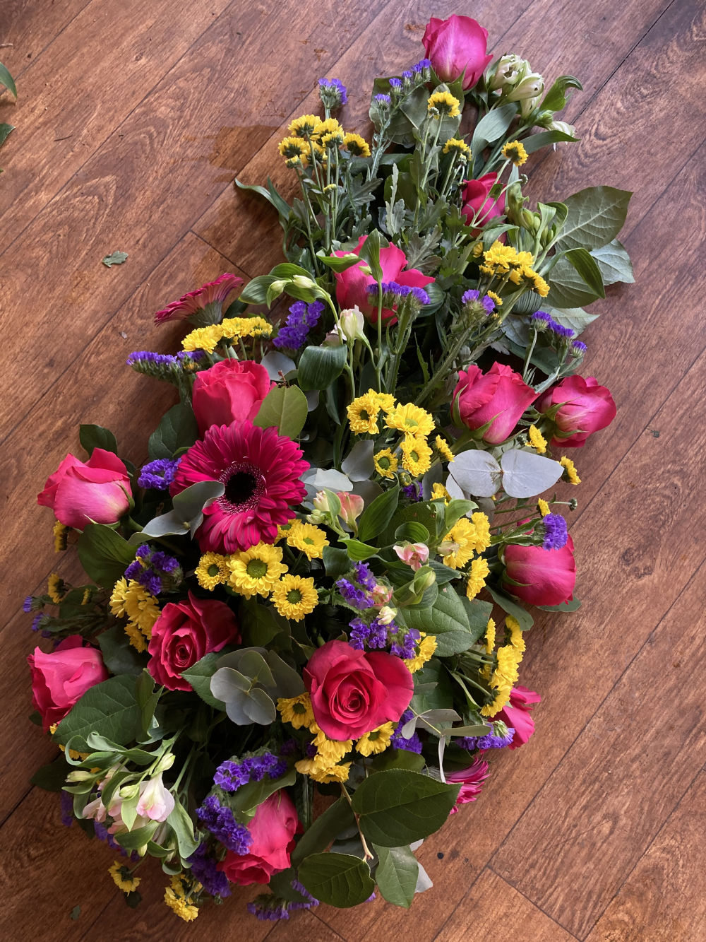 Vibrant Tribute Casket Spray