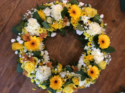 Yellow wreath - Loose ring wreath in shades of yellows and whites to include gerberas