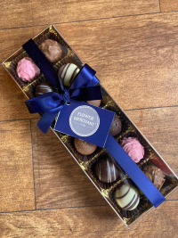 12 Chocolate Truffles - An assortment of filled Milk, Dark and White chocolates truffles.

Please note these do contain the following
Milk, Eggs, Hazelnuts, Soya, Whey, Almonds, Wheat and Alcohol. May also contain traces of other Tree nuts