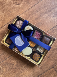 12 Mixed Chocolates - An assortment of filled Milk, Dark and White chocolates truffles.

Please note these do contain the following
Milk, Eggs, Hazelnuts, Soya, Whey, Almonds, Wheat, Butter, Oatmeal (Oats) and Alcohol. May also contain traces of other Tree nuts