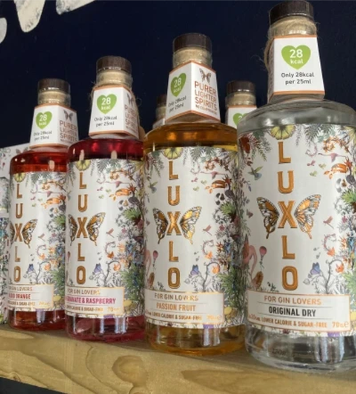 Luxlo - LUXLO Original Dry for Gin Lovers is their take on a London Dry. It is juniper led and packed with nine botanicals, each individually distilled to give a refreshing, clean and balanced flavour. 20% ABV 70cl

LUXLO Passion Fruit for Gin Lovers is packed with botanicals and infused with natural passionfruit extract yielding a refreshing, clean and rounded flavour. 20% ABV 70cl

LUXLO Pomegranate & Raspberry for Gin Lovers is packed with botanicals and infused with natural pomegranate and raspberry extract, yielding a refreshing, clean and rounded flavour. 20% ABV 70cl

LUXLO Blood Orange for Gin Lovers is packed with botanicals and infused with natural blood orange extract yielding a refreshing, clean and rounded flavour. 20% ABV 70cl