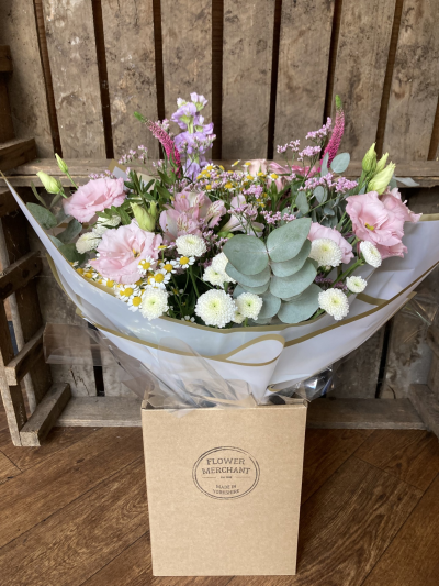Pretty in Pink - Carefully selected soft pink and white white, flowers and foliage, handtied, wrapped in deluxe wrapping and presented in a box. Each and every display is one-of-a-kind, created by an artisan florist using the most beautiful and fresh stems available on the day so, whilst your gift may look different to the one pictured, we do guarantee that your specific arrangement will be fresh, beautiful and that your recipient will love it!